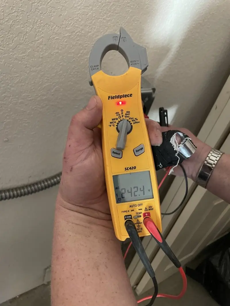 Voltage testing with clamp meter during Circuit Breaker Repair in Martinsville